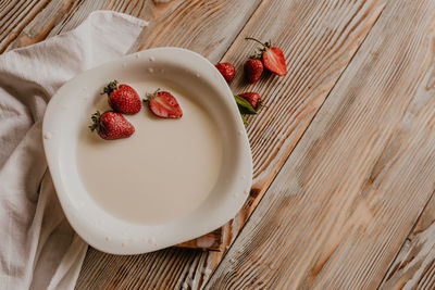 High angle view of strawberries on table