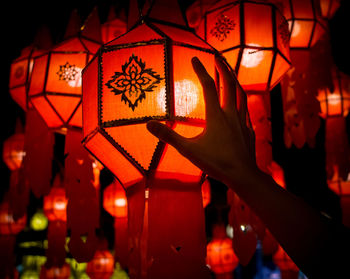 Close-up of illuminated lantern hanging at night