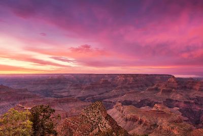 Scenic view of landscape against sky during sunset