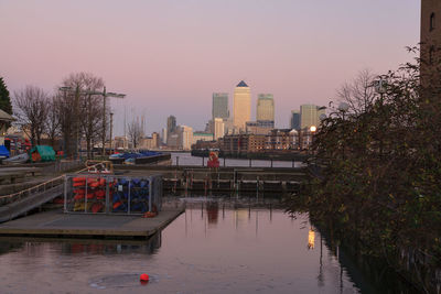 Buildings in city at dusk