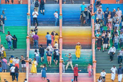 High angle view of people crossing street