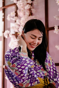 Smiling woman wearing kimono
