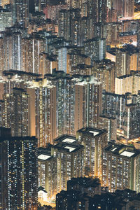 Aerial view of city lit up at night