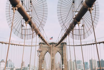 Brooklyn bridge in city against sky