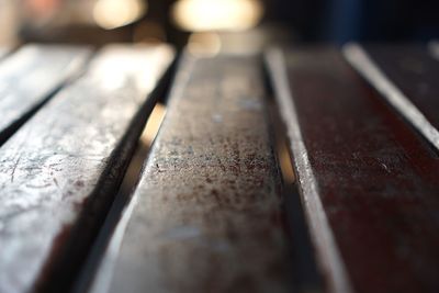 Close-up of old wooden table