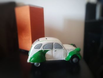 Close-up of toy car on table at home