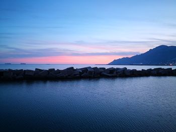 Scenic view of sea against sky during sunset