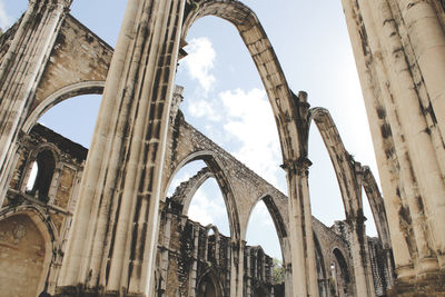 Low angle view of old ruin against sky