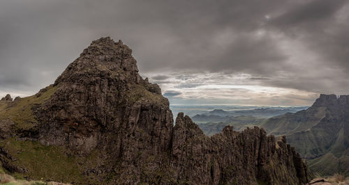 Panoramic view of rock formations against sky