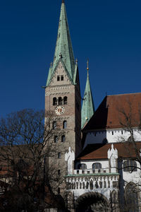 Low angle view of building against blue sky