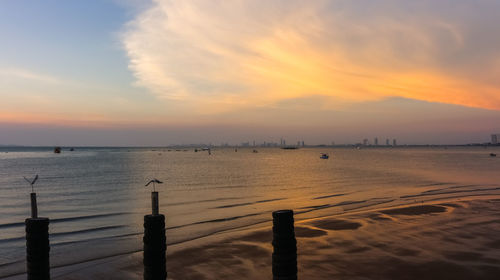 Scenic view of sea against sky during sunset