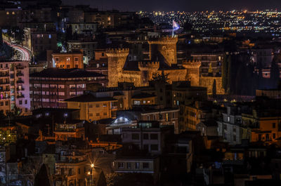 High angle view of illuminated city at night