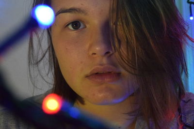 Close-up portrait of young woman