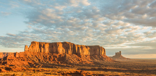 Rock formations in desert against sky