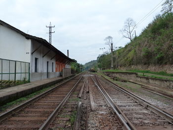 Railroad tracks against sky