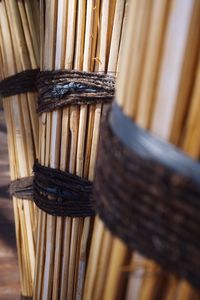 Close-up of fork and bread on wood