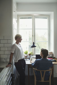 Industrial designers discussing at home office