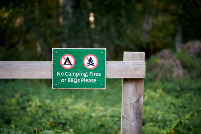No camping, fire or bbqs please sign in the park. selective focus on sign.