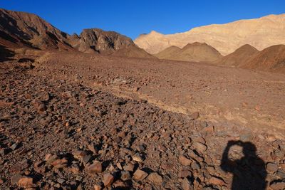 Scenic view of mountains against clear sky