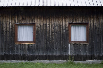 Closed wooden door of house