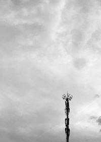 Low angle view of statue against sky