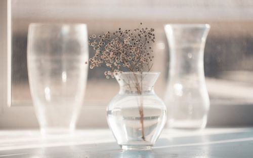 Close-up of drinking glass on table