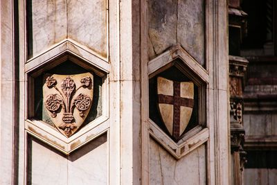 Carving on wall of building