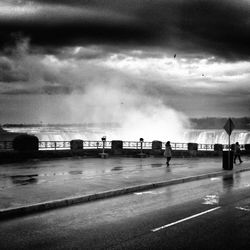 Road against cloudy sky