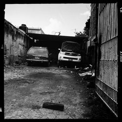 Cars on road against sky