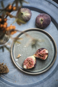 High angle view of fig in plate on table