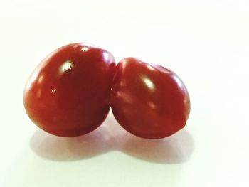 Close-up of strawberry over white background