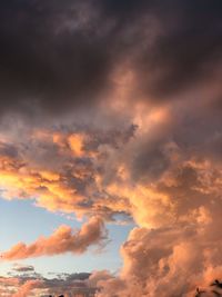 Low angle view of dramatic sky during sunset