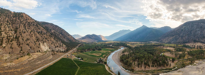 Panoramic view of road amidst mountains against sky