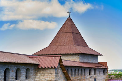 Low angle view of traditional building against sky