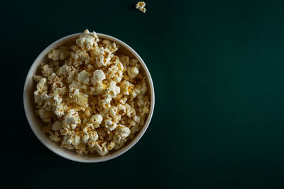 High angle view of breakfast in bowl against black background