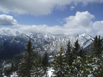 Scenic view of snowcapped mountains against sky