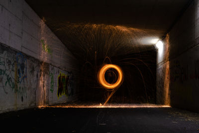 Illuminated tunnel in abandoned building