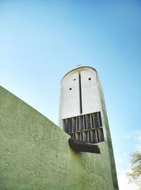 Low angle view of building against blue sky