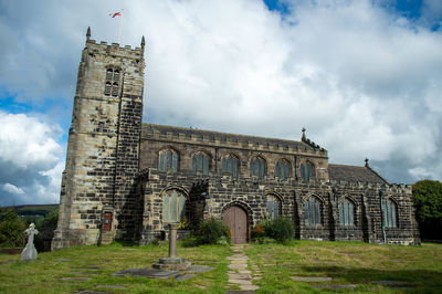 Low angle view of old building against sky