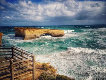 Scenic view of sea against cloudy sky
