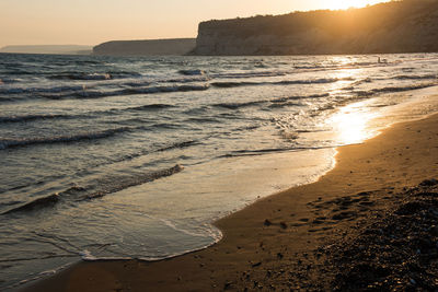 Scenic view of sea against sky during sunset