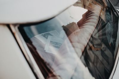High angle view of man holding paper