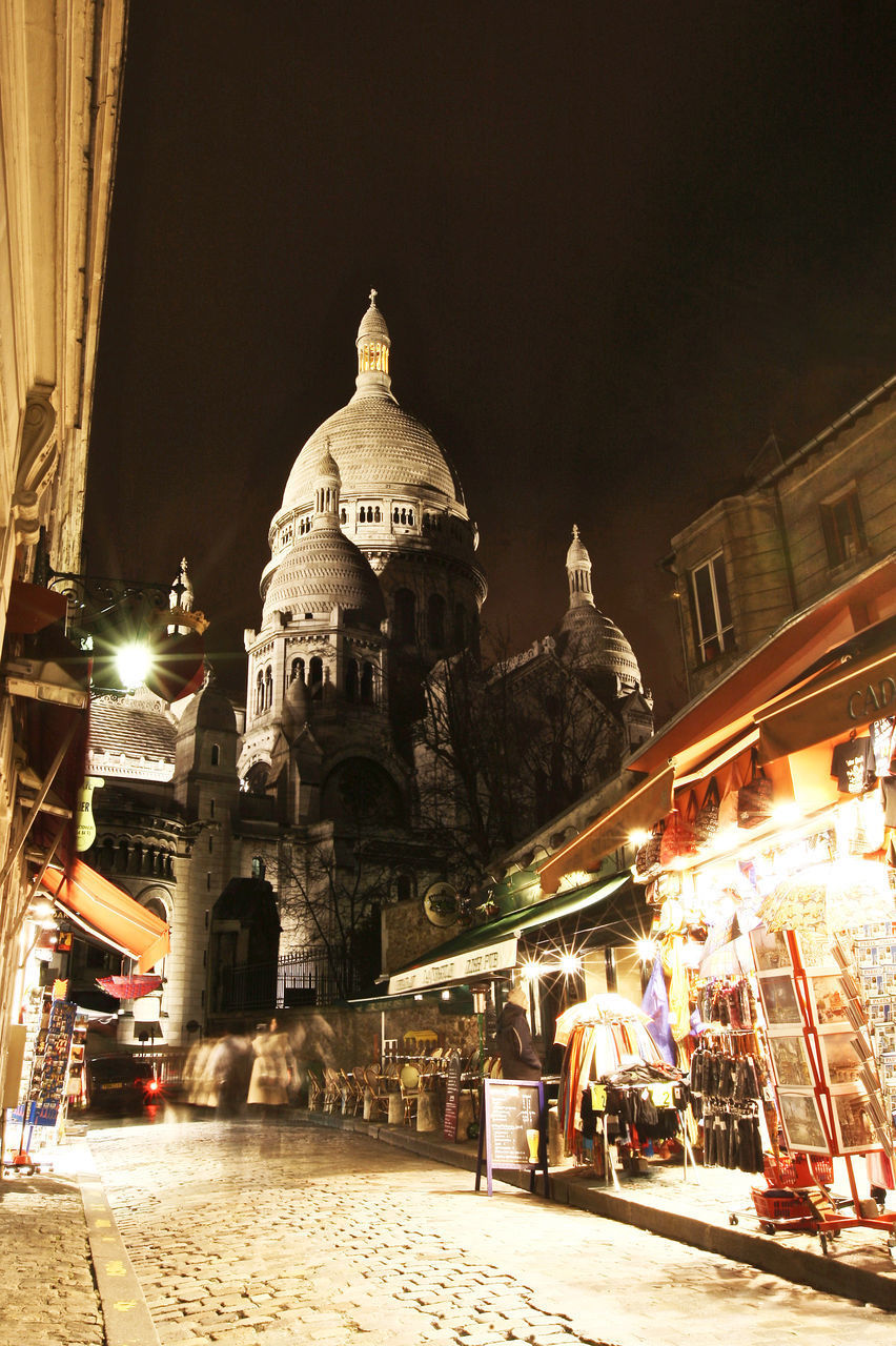 ILLUMINATED BUILDINGS AT NIGHT