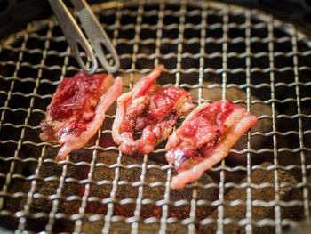 Close-up of meat on barbecue grill