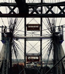 Low angle view of cables against sky