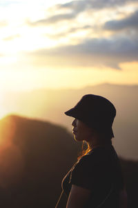 Portrait of silhouette man against sky during sunset