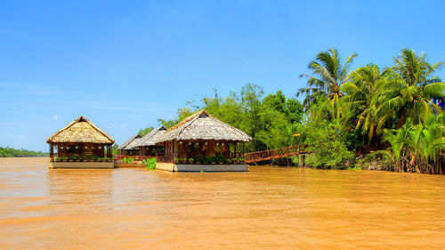 Built structure and trees in water