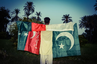 Low angle view of flag against sky