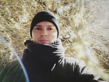 Portrait of young man in winter at night