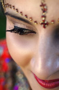 Close-up of woman wearing make-up